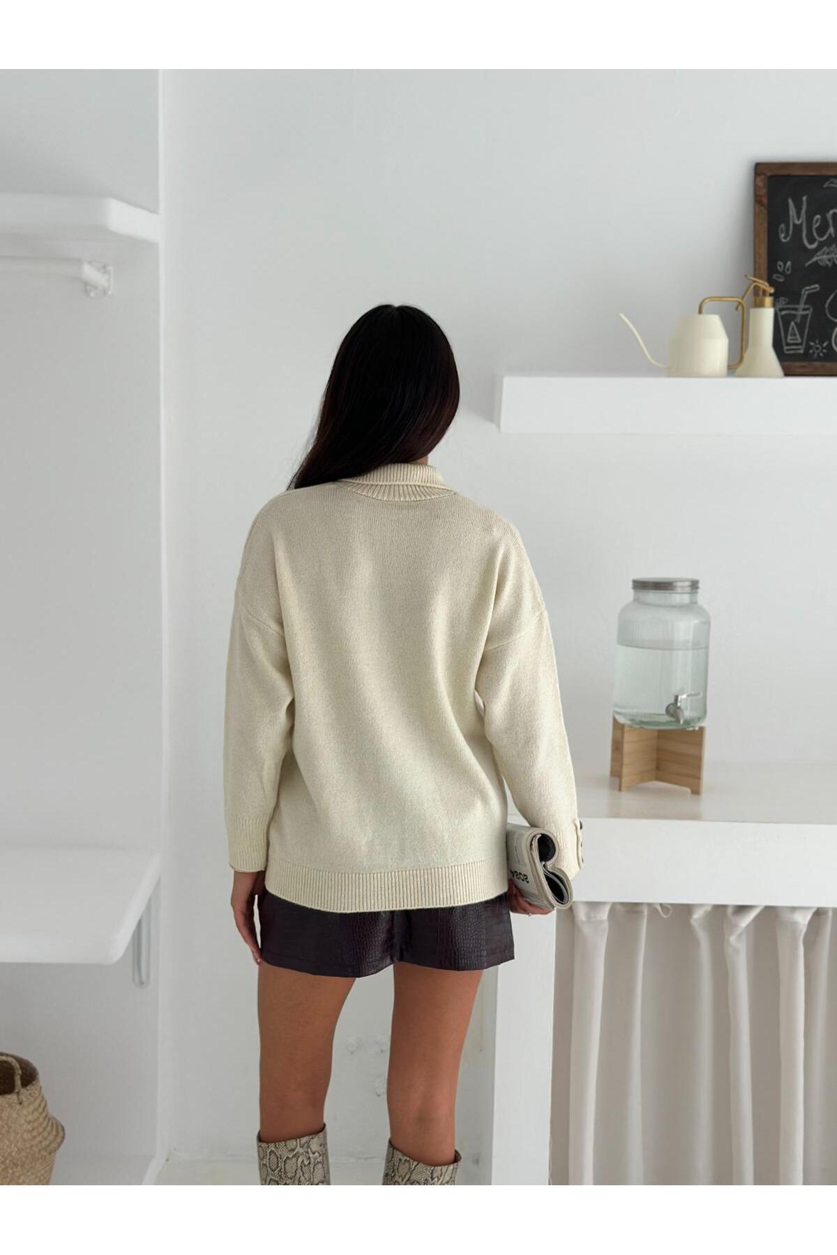 Half Placket Polo Neck Knit Sweater with Button Sleeve Detail